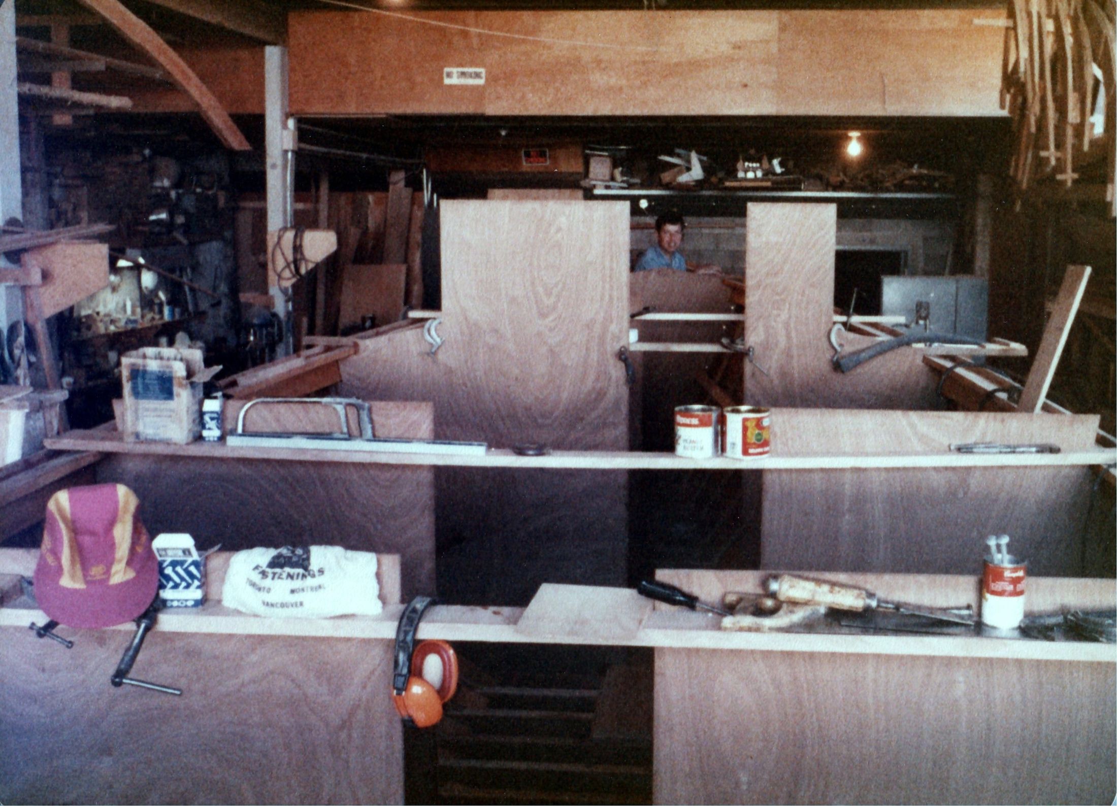 Bulkheads in place, paint cans and ear protectors on the bench