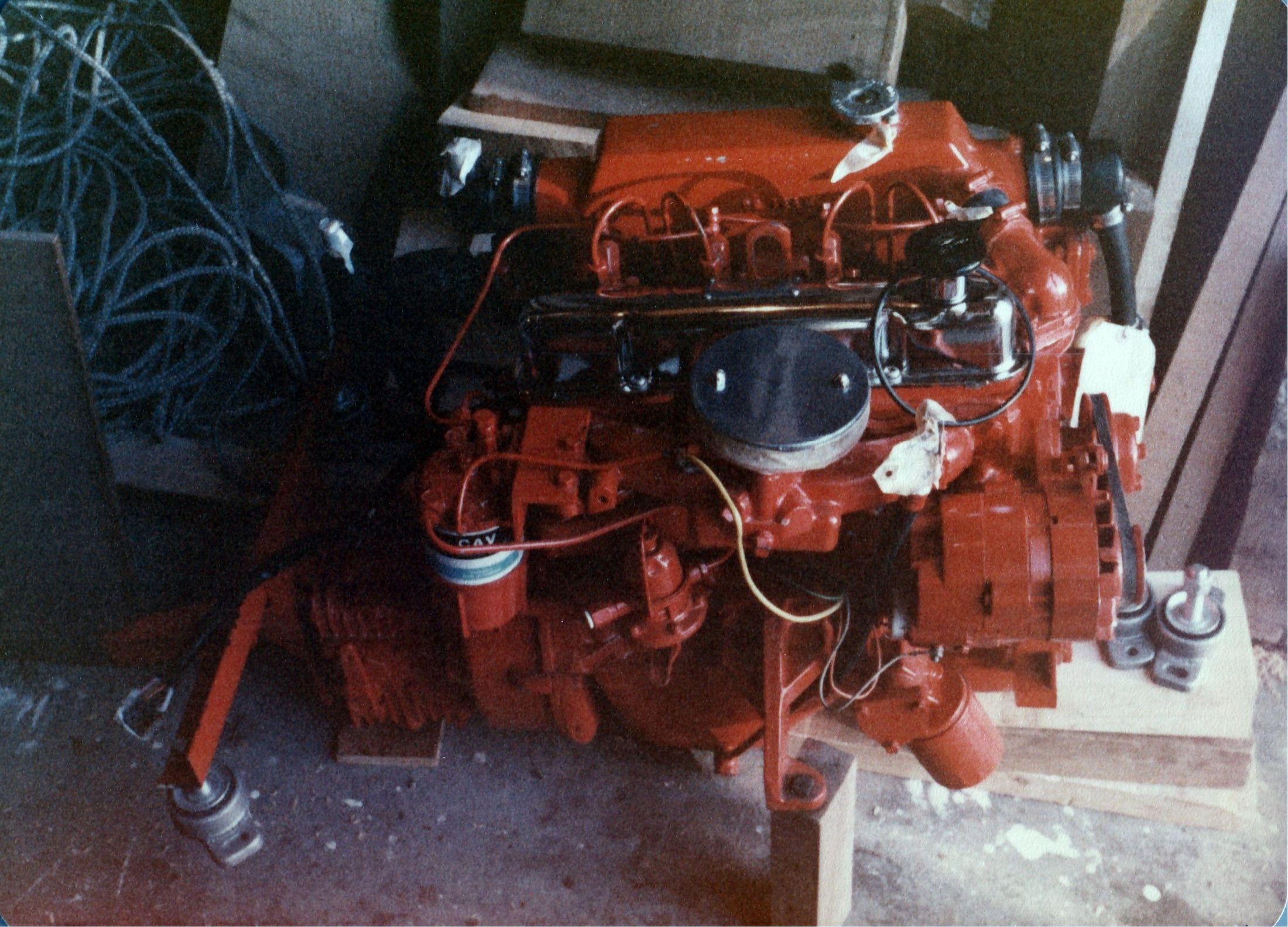 The red engine on a pallet on the shop floor