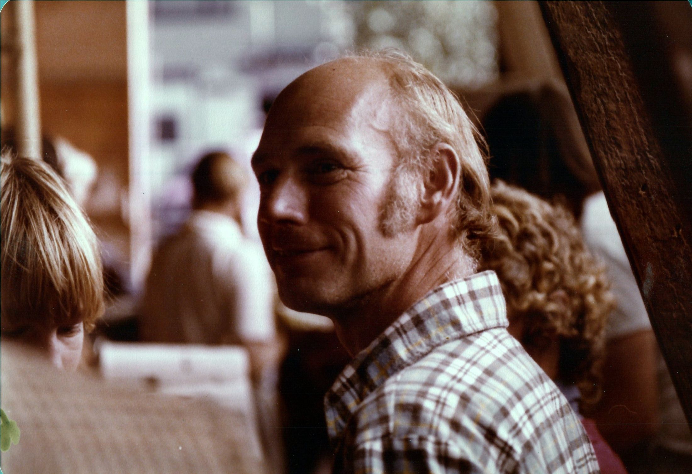 A man smiling at the launch party